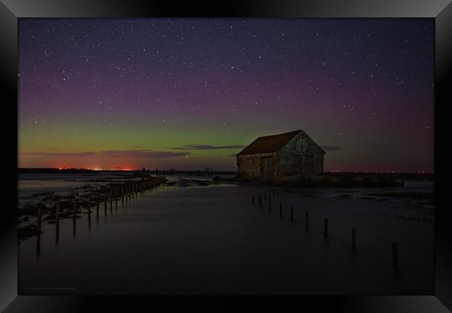 The Northern lights over the old coal barn at Thornham  Framed Print by Gary Pearson