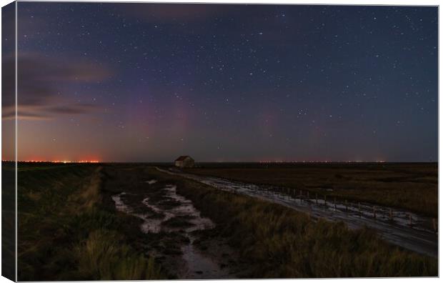 The Northern lights arrive at Thornham in Norfolk  Canvas Print by Gary Pearson