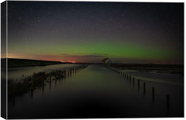 A high Spring tide and the Northern lights over the old coal barn Canvas Print by Gary Pearson
