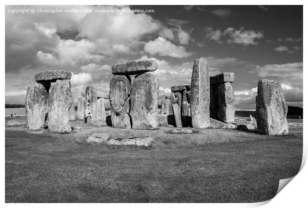 Cloudy skies over Stonehenge in black and white Print by Christopher Keeley