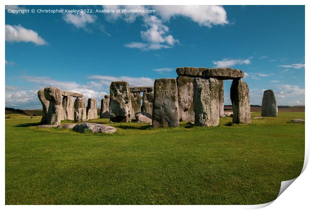 A sunny day at Stonehenge Print by Christopher Keeley