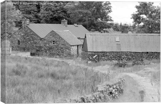 Old farm buildings in monochrome  Canvas Print by Richard Long