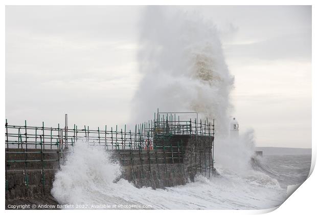 Waves crash over Porthcawl lighthouse Print by Andrew Bartlett
