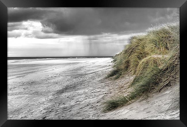 Passing Storm on Bamburgh Beach Framed Print by Kevin Tate