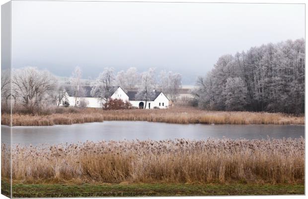 Winter landscape with old house Canvas Print by Sergey Fedoskin