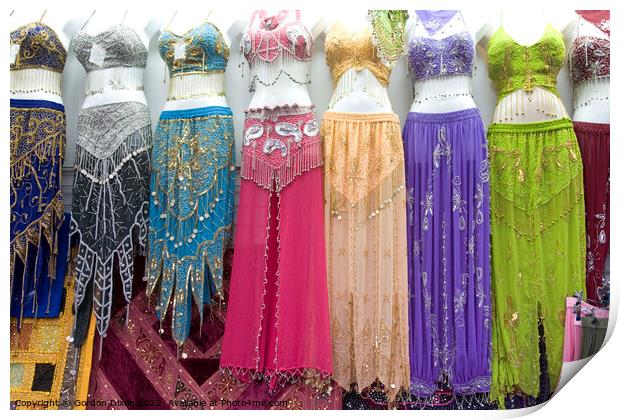 Belly dancer's dresses for sale in the cloth souk, Bur Dubai, UAE Print by Gordon Dixon