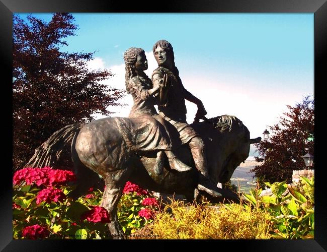 A statue of a couple  riding a horse Framed Print by Stephanie Moore