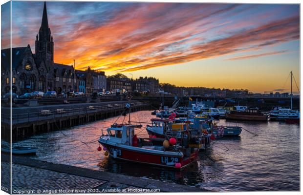 Dramatic sunset at Newhaven Harbour, Edinburgh Canvas Print by Angus McComiskey
