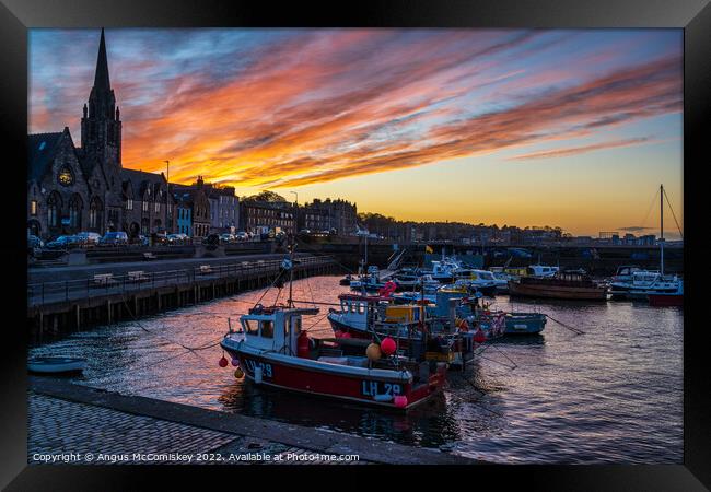 Dramatic sunset at Newhaven Harbour, Edinburgh Framed Print by Angus McComiskey