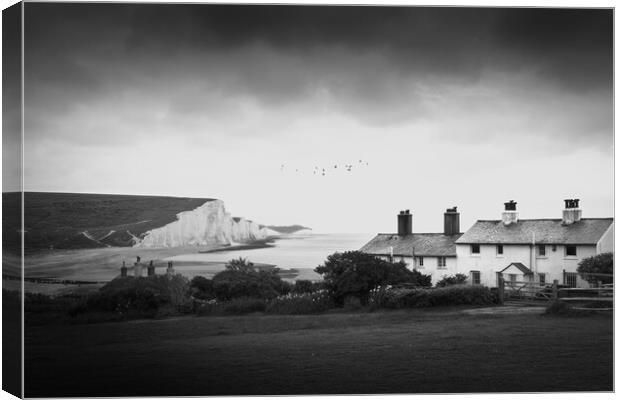 The Coastguard Cottages and the Seven Sisters Canvas Print by Mark Jones