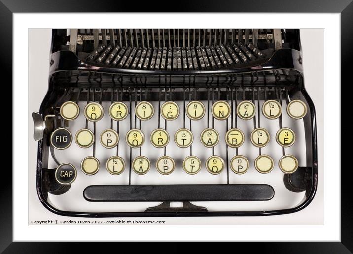 Typewriter keys rearranged to say 'Original Portable Laptop' Framed Mounted Print by Gordon Dixon