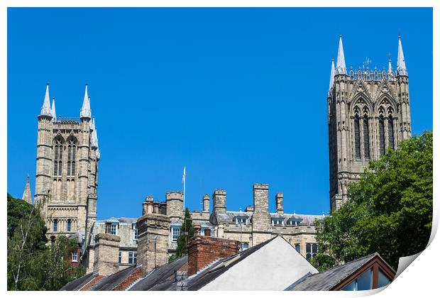 Lincoln cathedral peaks above the city skyline Print by Jason Wells