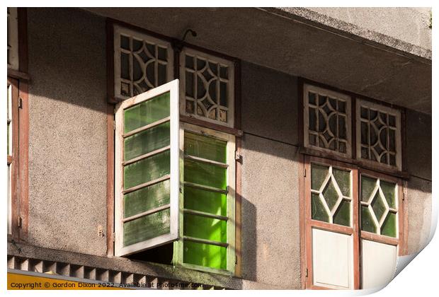 Old green glass windows on an old 'colonial' house in Mumbai, India Print by Gordon Dixon