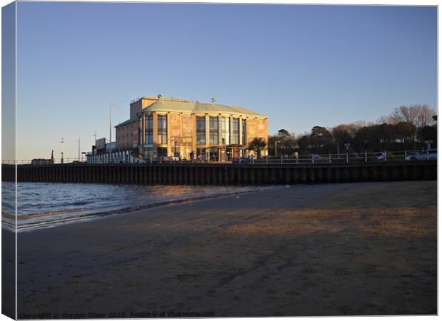 Weymouth Pavilion - lit by sunset on a winter's day Canvas Print by Gordon Dixon