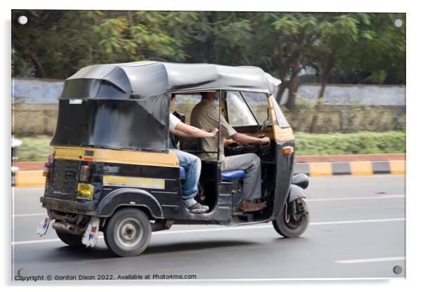Autorickshaw driving down a road with passenger - Delhi, India Acrylic by Gordon Dixon