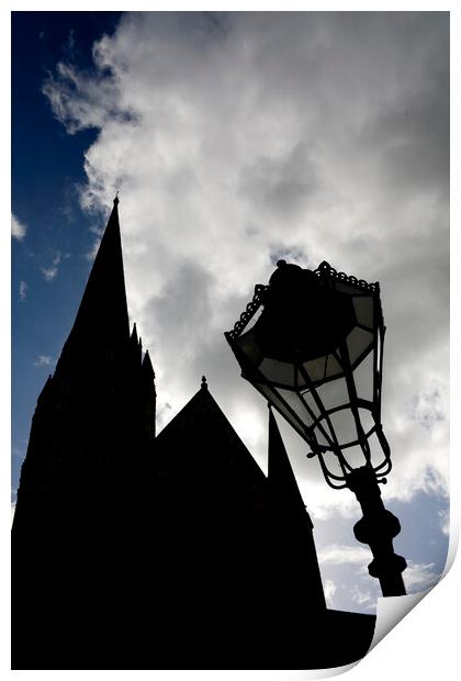 Iconic spire of Salisbury Cathedral and ornate street lamp in silhouette Print by Gordon Dixon