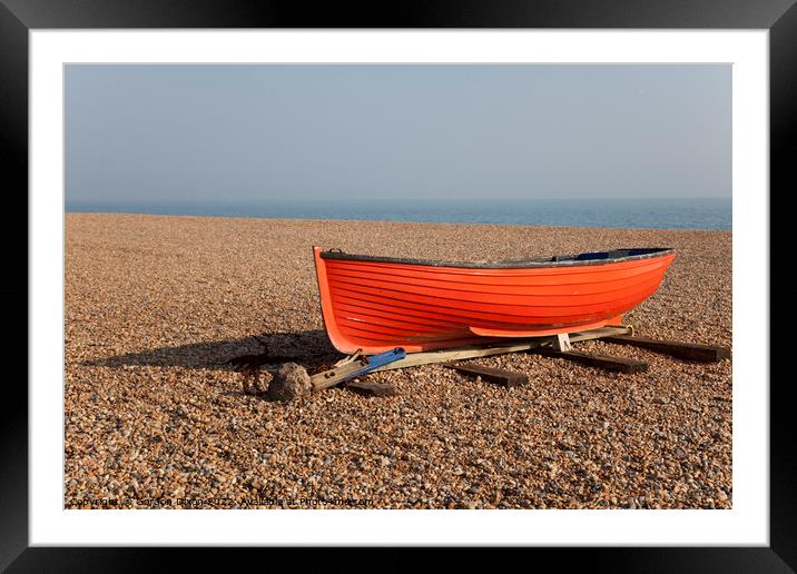 Small red fishing boat on shingle on Brighton beac Framed Mounted Print by Gordon Dixon