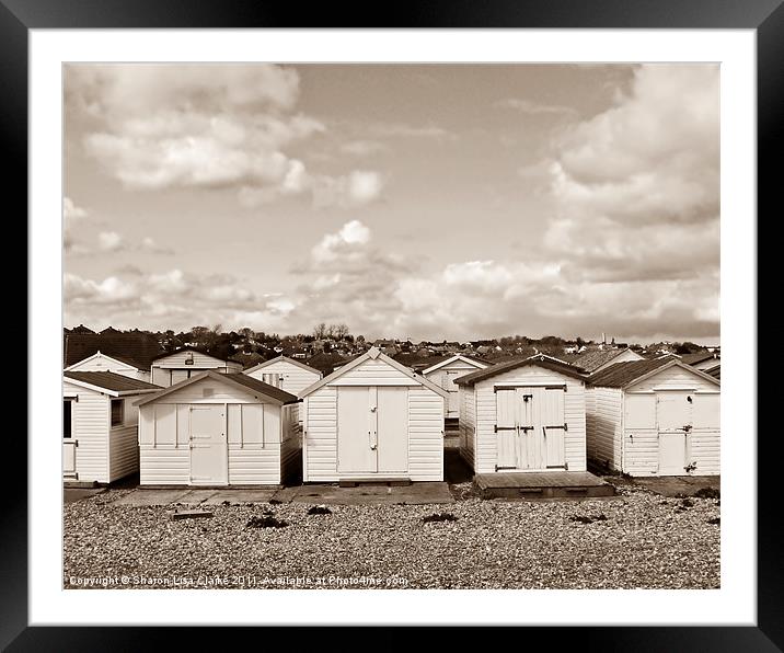 Beach huts at West St leonards Framed Mounted Print by Sharon Lisa Clarke