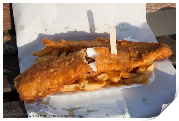 Golden brown battered fish with chips and a wooden fork in paper - delicious Print by Gordon Dixon