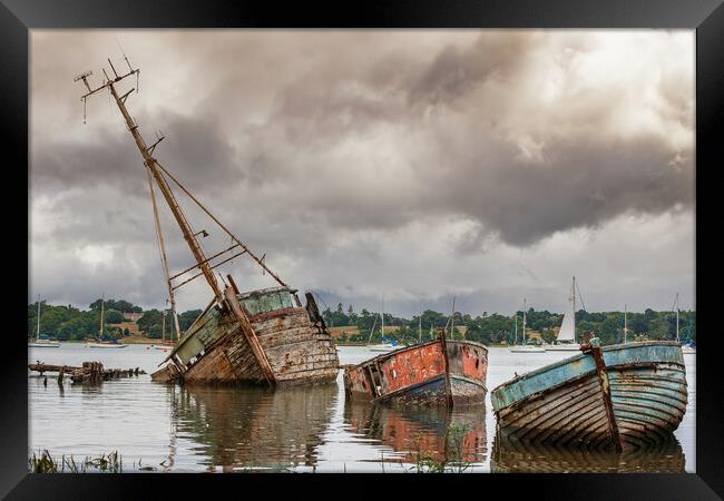 The Haunting Beauty of Pin Mill Boat Graveyard Framed Print by Kevin Snelling