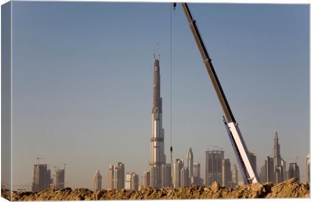 Checking it's vertical - Sheik Zayed Road skyline during construction of the Burj Khalifa, Dubai Canvas Print by Gordon Dixon