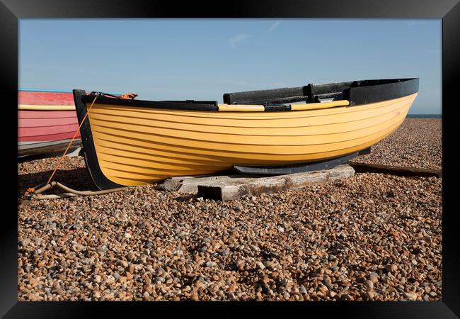 Yellow fishing boat on shingle  - Brighton beach Framed Print by Gordon Dixon
