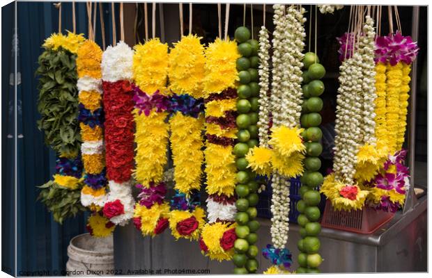 Floral garlands for sale as offerings at a Hindu temple in Kuala Lumpur, Malaysia Canvas Print by Gordon Dixon