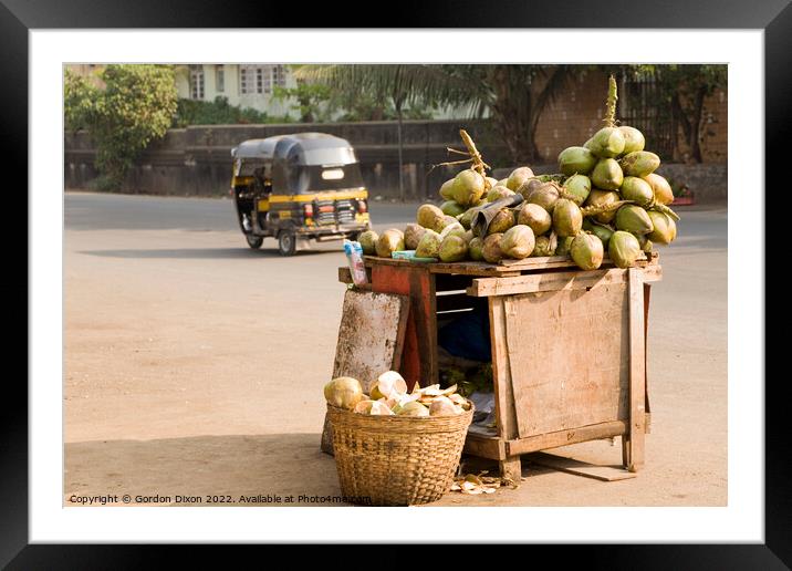 Fresh coconuts for sale on the roadside at Mumbai, India Framed Mounted Print by Gordon Dixon