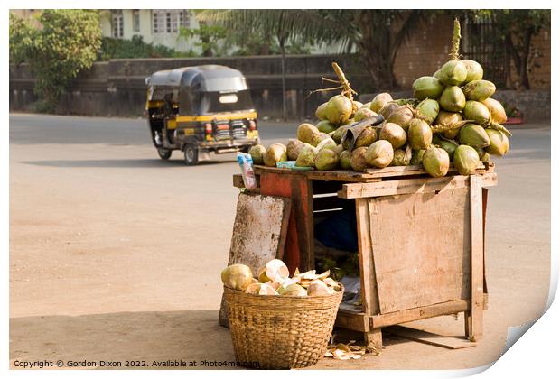 Fresh coconuts for sale on the roadside at Mumbai, India Print by Gordon Dixon