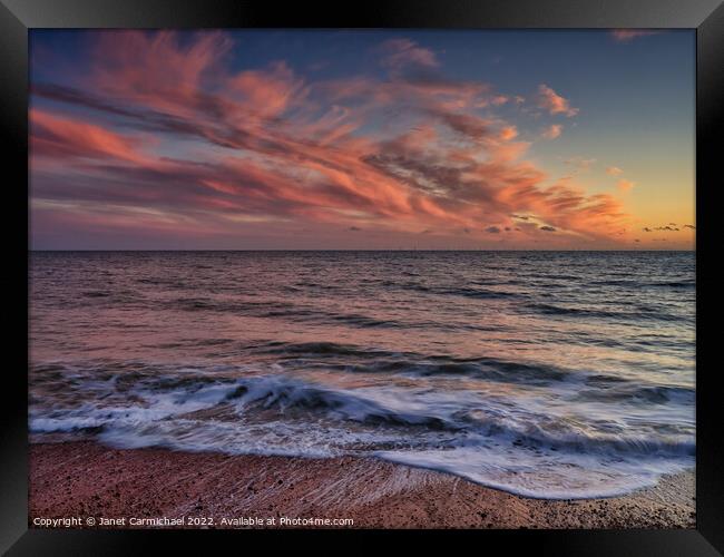 Tranquil Beach Sunset Framed Print by Janet Carmichael