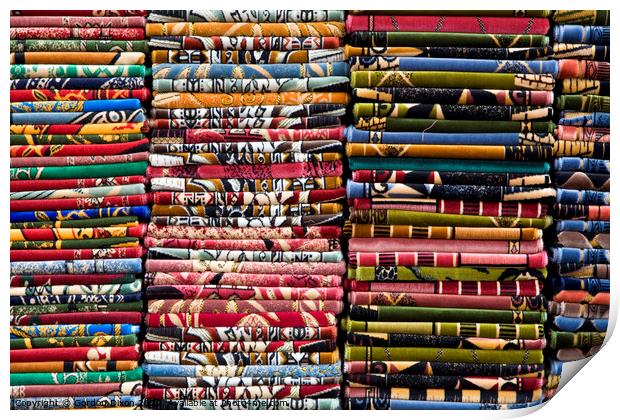Stacks of colourful Prayer Mats for sale at an Istanbul market Print by Gordon Dixon