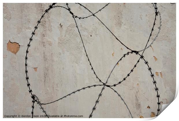 Razor wire outside an abandoned prison 's walls in Pudu, Kuala Lumpur. Print by Gordon Dixon