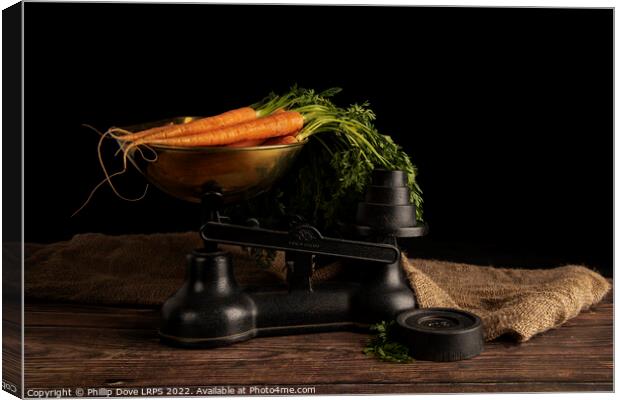 Weighing the carrots Canvas Print by Phillip Dove LRPS