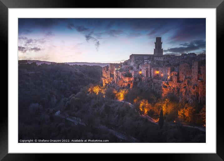 Tuscany, Pitigliano medieval village at blue hour. Italy Framed Mounted Print by Stefano Orazzini