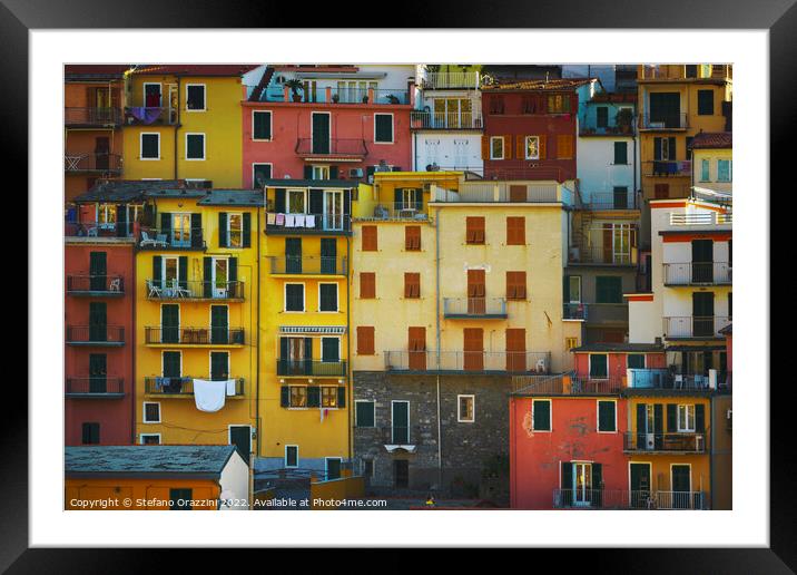 Manarola village, colorful pattern of houses. Cinque Terre Framed Mounted Print by Stefano Orazzini