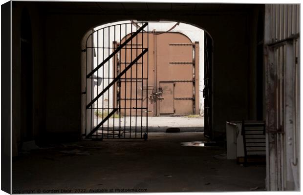 Prison Main gate - from the inside. Abandoned Pudu jail, Kuala Lumpur Canvas Print by Gordon Dixon