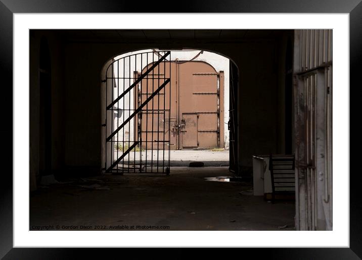 Prison Main gate - from the inside. Abandoned Pudu jail, Kuala Lumpur Framed Mounted Print by Gordon Dixon