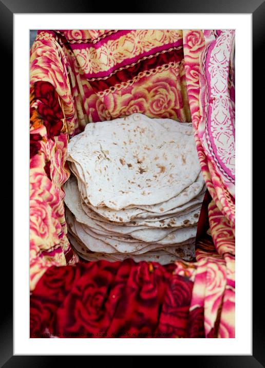 Turkish flatbreads for sale on a street market in Istanbul Framed Mounted Print by Gordon Dixon