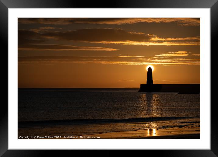 Sunrise behind the light tower at the entrance of Berwick upon tweed harbour Framed Mounted Print by Dave Collins