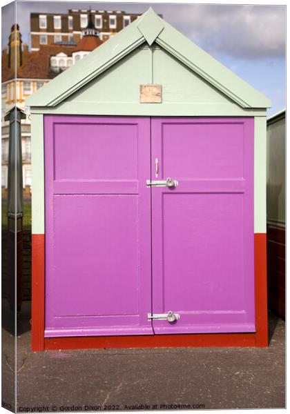 Purple coloured beach hut on esplanade, Brighton and Hove Canvas Print by Gordon Dixon