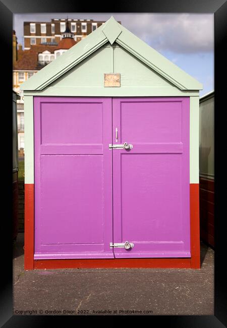Purple coloured beach hut on esplanade, Brighton and Hove Framed Print by Gordon Dixon