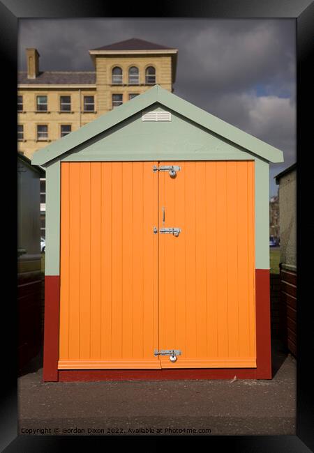 Orange coloured beach hut on the esplanade, Brighton and Hove Framed Print by Gordon Dixon