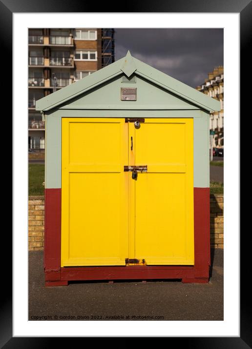 Yellow door of a beach hut on the esplanade, Brighton and Hove Framed Mounted Print by Gordon Dixon