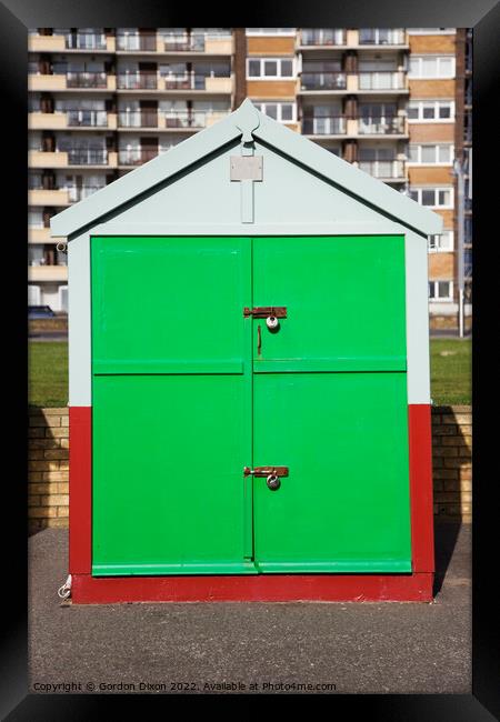 Bright green painted door of a sea front beach hut, Brighton and Hove Framed Print by Gordon Dixon