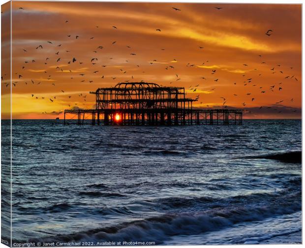 Starlings Circling at the West Pier Canvas Print by Janet Carmichael
