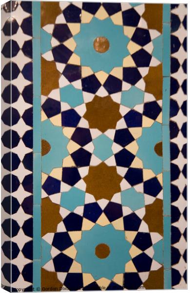 Islamic design in tiles at the tomb of the Persian poet Hafez in the Iranian city of Shiraz Canvas Print by Gordon Dixon