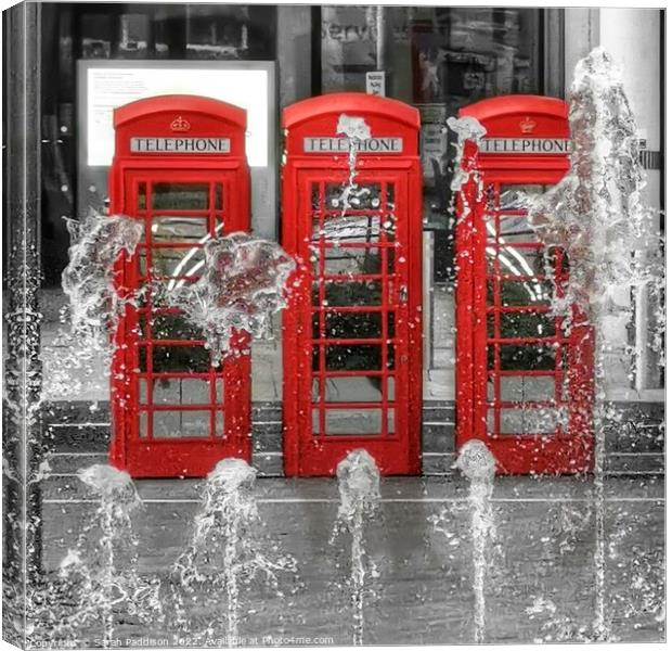 Iconic Red Phone Boxes Canvas Print by Sarah Paddison