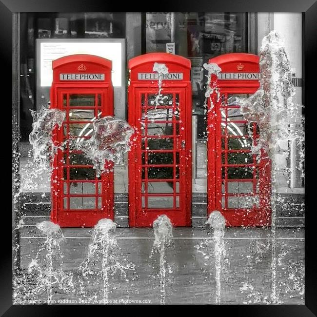 Iconic Red Phone Boxes Framed Print by Sarah Paddison