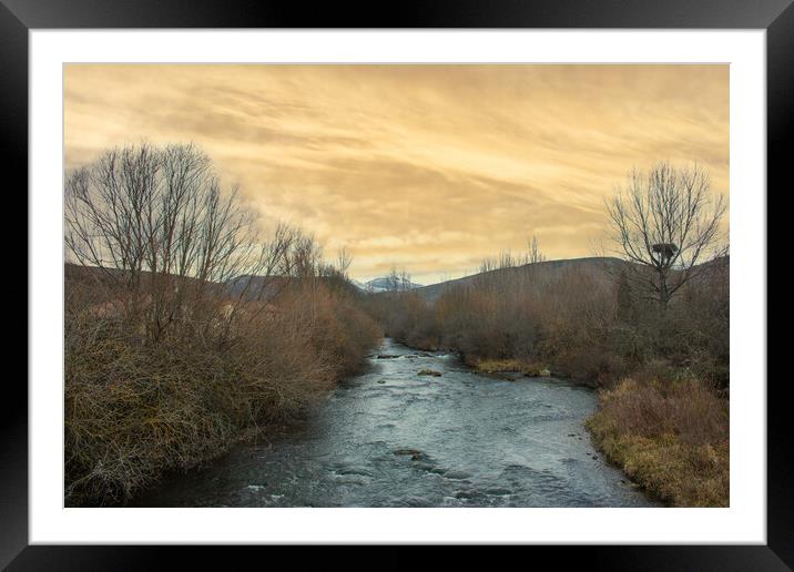 mountain river with vegetation and incredible skies Framed Mounted Print by David Galindo