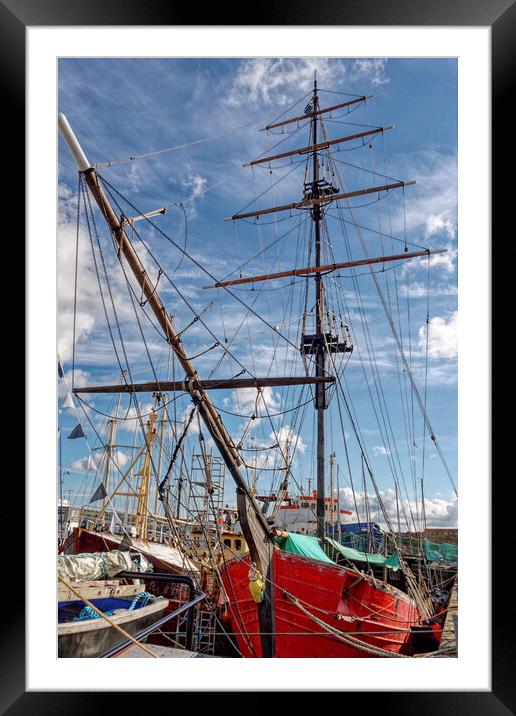 Red Sails Boldly Reflect in Penzance Harbour Framed Mounted Print by Roger Mechan